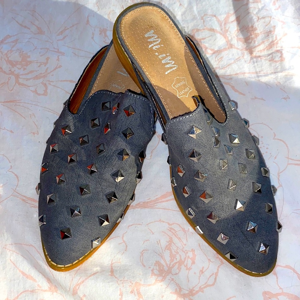 Gray mules that are super cute dressed up or down.